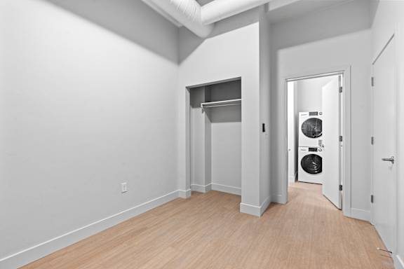 Laundry room with a washer and dryer at Brickside Heights, Millcreek, UT
