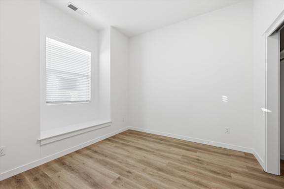 Room with hardwood floor at Alante Homes at Spring Run, Idaho