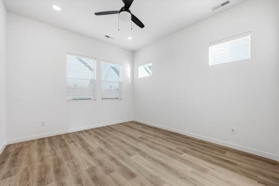Room with wooden flooring and a ceiling fan at Alante Homes at Spring Run, Caldwell, Idaho
