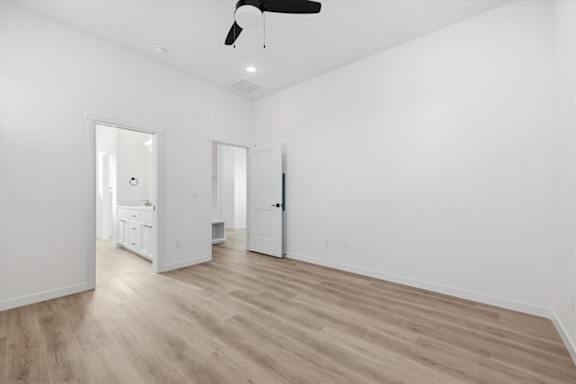Wooden floor and ceiling fan in room at Alante Homes at Spring Run, Idaho, 83607