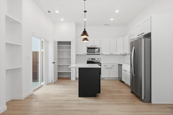 Black Island with white countertop at Alante Homes at Spring Run, Idaho, 83607