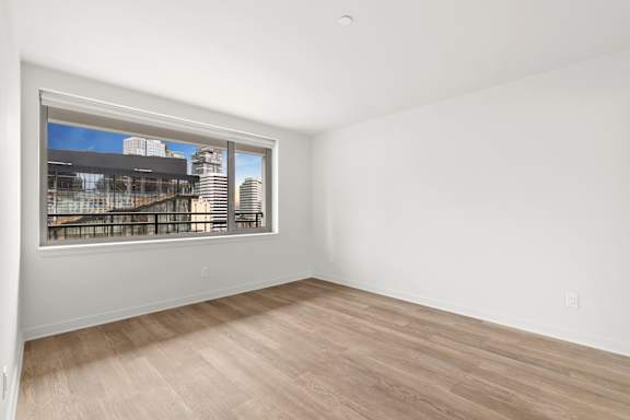 Room with Large glass windows11 at AVIA on Pike Street, Seattle, WA