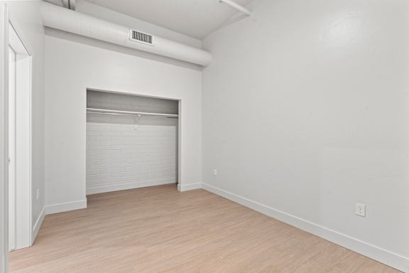 Room with attached closet at Brickside Heights, Millcreek, UT, 84106