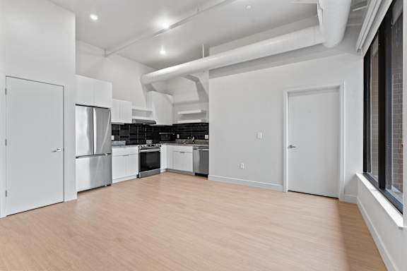 Kitchen with stainless steel refrigerator at Brickside Heights, Utah