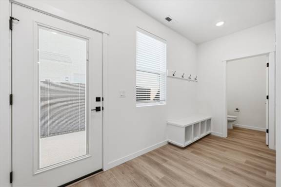 Vacant room with a bench at Alante Homes at Spring Run, Caldwell, ID