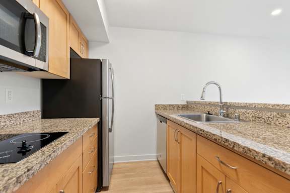 Kitchen with granite countertop6 at AVIA on Pike Street, Seattle, 98101