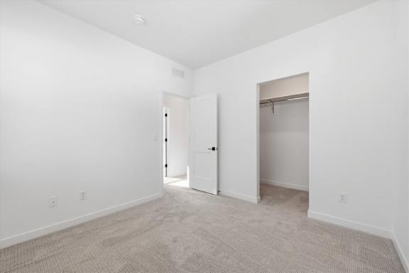 Spacious and vacant room with carpeted floor at Alante Homes at Spring Run, Idaho, 83607