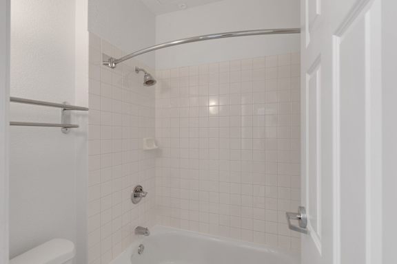 White Tiled Bathroom at AVIA Apartments On Alpha, Dallas, TX