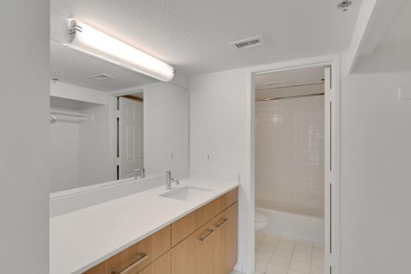 Bathroom with white sink2 at AVIA Apartments On Alpha, Texas, 75240
