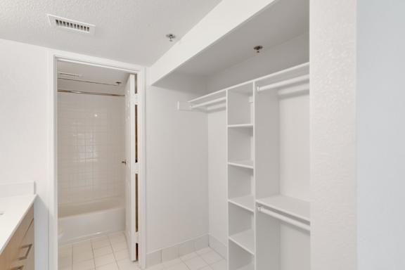 White walk-in closet2 at AVIA Apartments On Alpha, Dallas, 75240