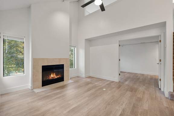 Room with large door, fireplace and fan at AVIA Lofts on Parkway, Washington , 98662