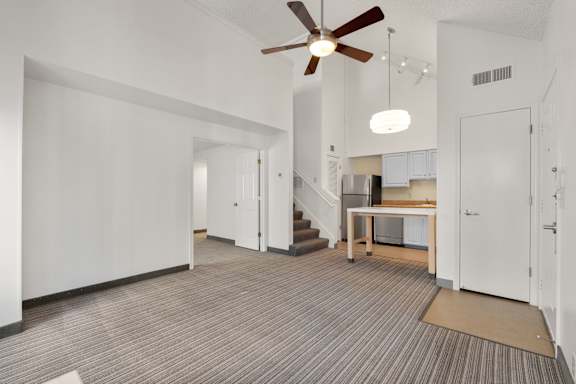 Spacious empty room with wooden flooring at AVIA Lofts on Parkway, Vancouver, WA 98662
