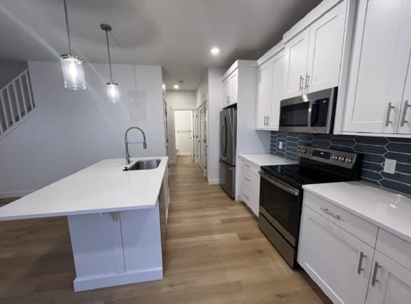 4 bedrooms kitchen view side at Alante Homes at Lake Hazel, Boise, Idaho