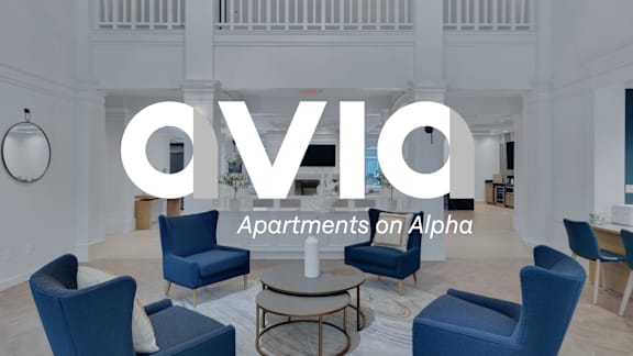 A family holding hands in a park1 at AVIA Apartments On Alpha, Dallas, TX, 75240