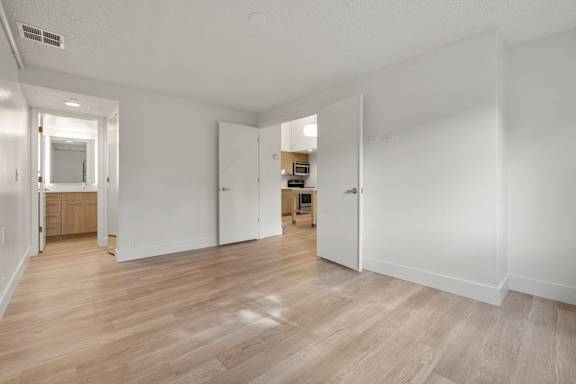 Room with white walls and door at AVIA Lofts on Parkway, Vancouver, 98662