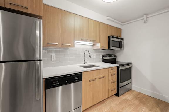 Timeless Wood &amp; Steel Design at AVIA Lofts on Parkway, Vancouver