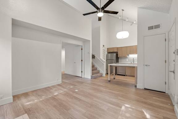 Bright empty interior with wooden floor at AVIA Lofts on Parkway, Vancouver, WA 98662