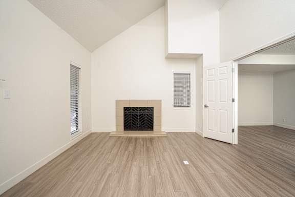 Unfurnished room with fireplace at AVIA Lofts on Liberty Ridge, Florida