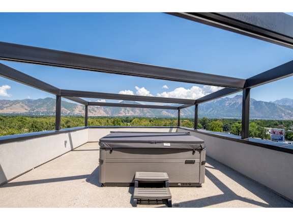 Rooftop hot tub with mountain views at Brickside Heights Apartments, Millcreek, 84106