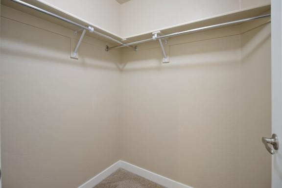 A white wall with a door and a white shelf above it at Siena Villas Apartments, Orem, 84097