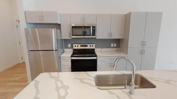 Sink With Faucet In Kitchen at SevenO2 Main Apartments, Utah, 84101