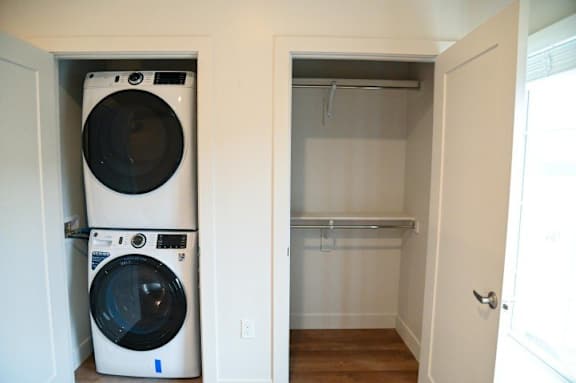 Stackable washer and dryer with closet storage at The Revival Apartments, Salt Lake City, UT