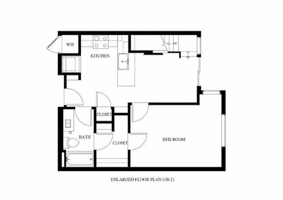 A floor plan of a small apartment with a kitchen, bathroom, bedroom and closet.