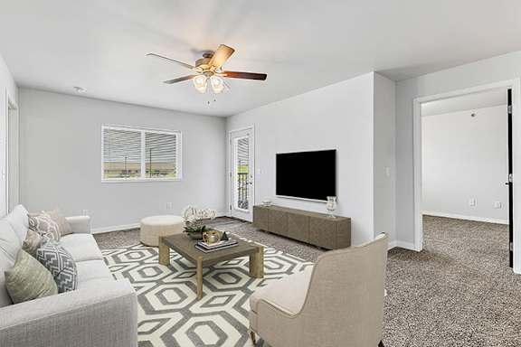 Living room with tv at Red Rock Apartments, Rapid City, 57702