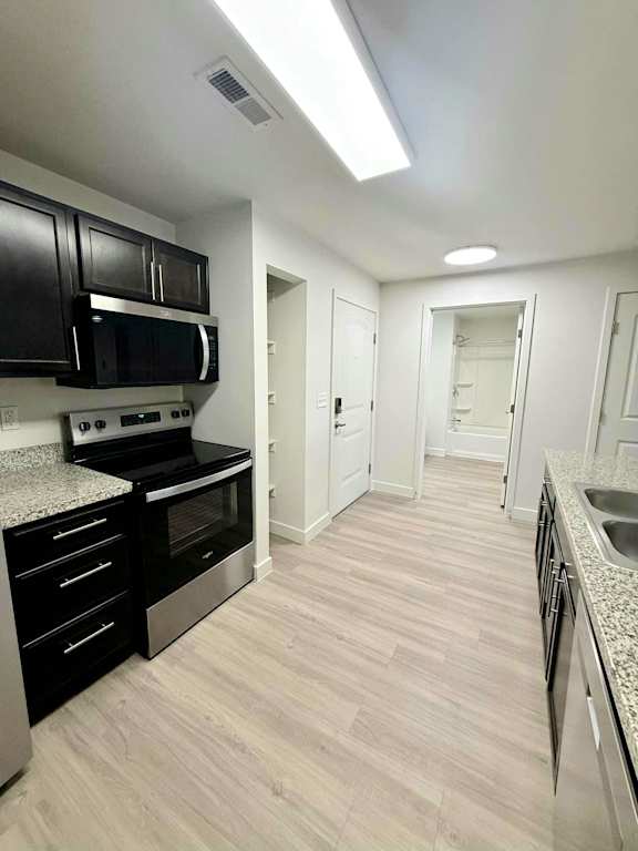 Kitchen with black cabinets at The View on 20th, Ogden, 84401