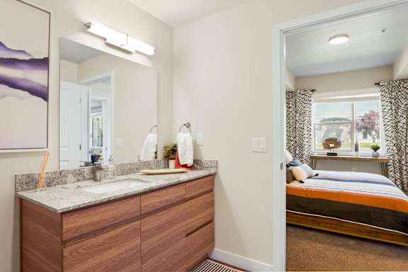 Bedroom with attached bathroom at The Flats at Riverwoods, Utah, 84604