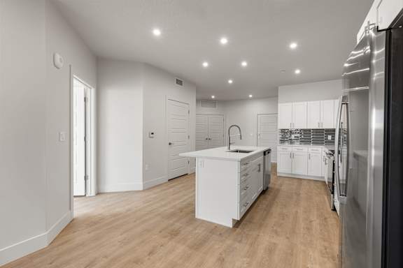 Modern Kitchen With Stainless Steel Appliances And Double Door Refrigerators at The Vue At Desert Color, St. George