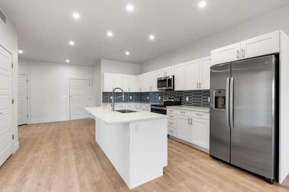 A modern kitchen at The Vue At Desert Color, St. George, Utah