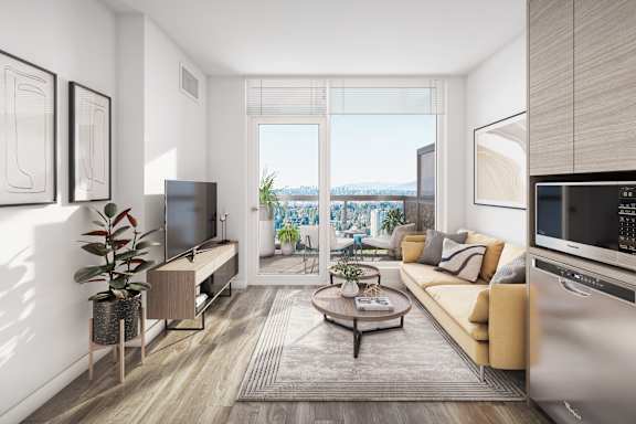 A modern living room with a large window overlooking a cityscape.