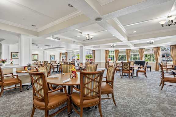 Large room with a dining table and chairs at Lakeview Senior Living Apartments, Lakewood, 80227
