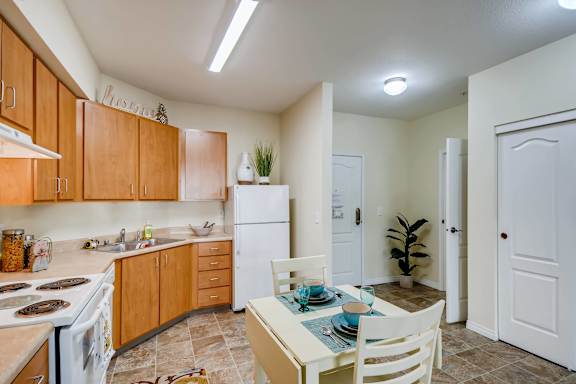 Kitchen with cabinets at Vancouver Pointe, Vancouver, Washington