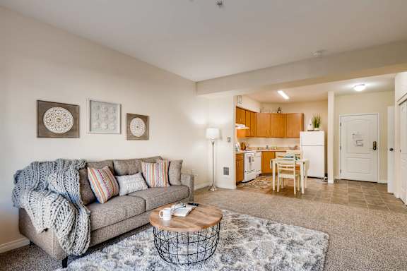 Living room with couch at Vancouver Pointe, Washington, 98661