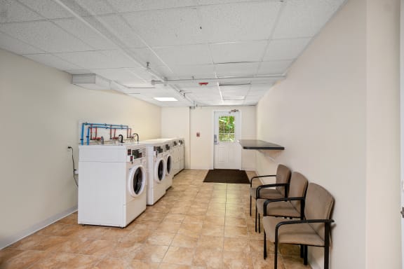 Taymil 125 Charles Apartment Homes Laundry Facility
