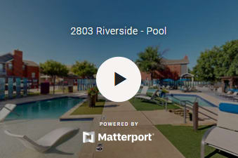 A pool with a play button and the text