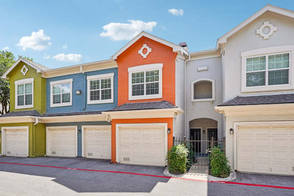 A row of houses with garages in front at Reserve at Canyon Creek, San Antonio,78230