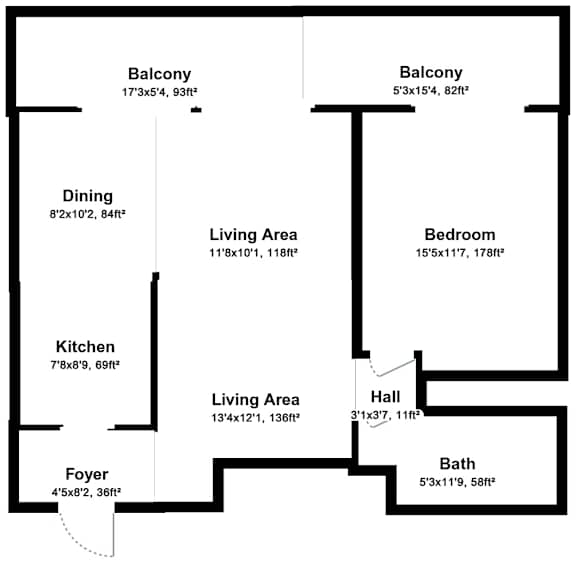 A floor plan of a house with a living area, kitchen, dining area, two balconies, a bedroom, a bath, and a foyer.