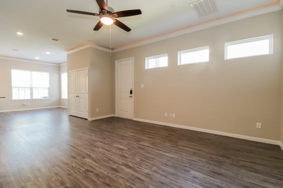 Spacious Living Area with Luxury Laminate Wood Flooring