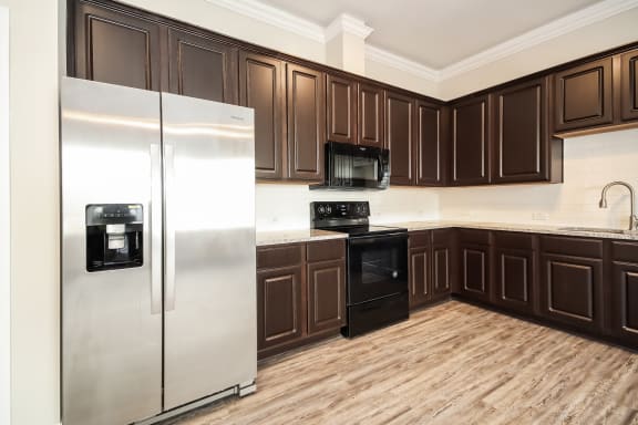 Open Concept Kitchen with Appliances and Granite Countertops