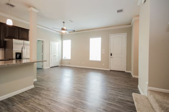 Spacious Living Area with Luxury Laminate Wood Flooring