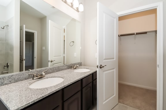Bathroom with Granite Countertops and Double Vanity
