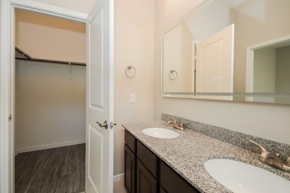 Bathroom with Granite Countertops and Double Vanity