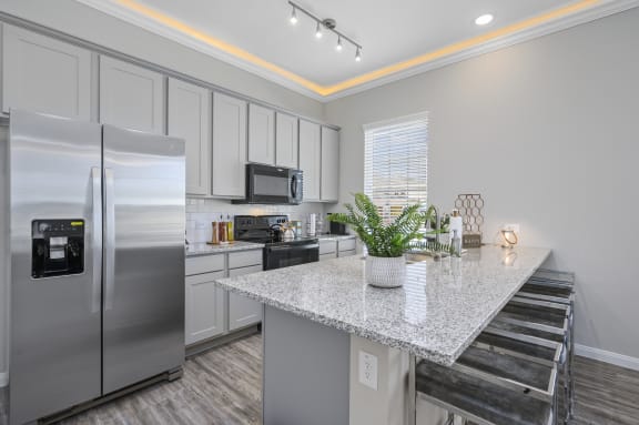 Upscale Stainless Steel Kitchen Appliances With Double Door Refrigerator at Clearwater at Balmoral, Atascocita, TX, 77346