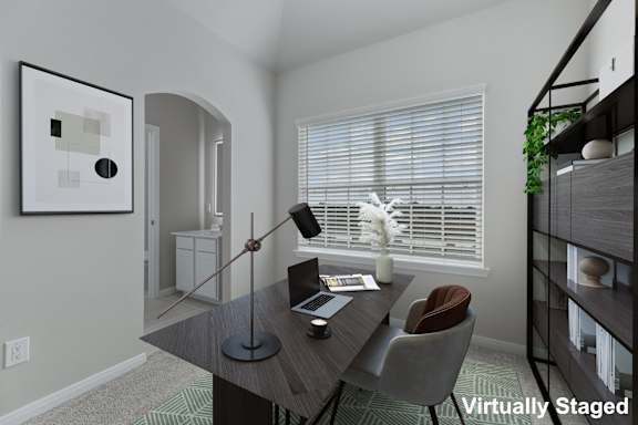 A modern dining room with a dark wood table and a single chair.