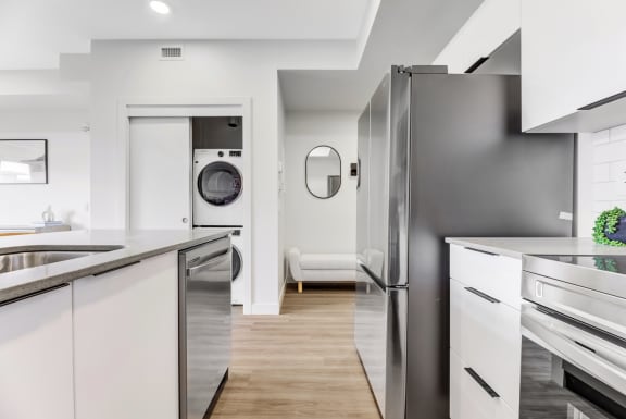 49th Battalion studio kitchen and washer