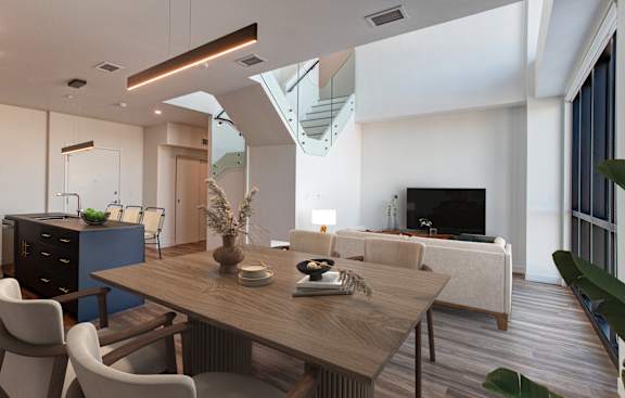 a living room and dining room with a wooden table and chairs
