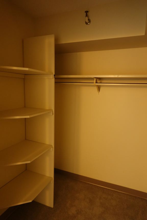 A white door with a handle and a keyhole.